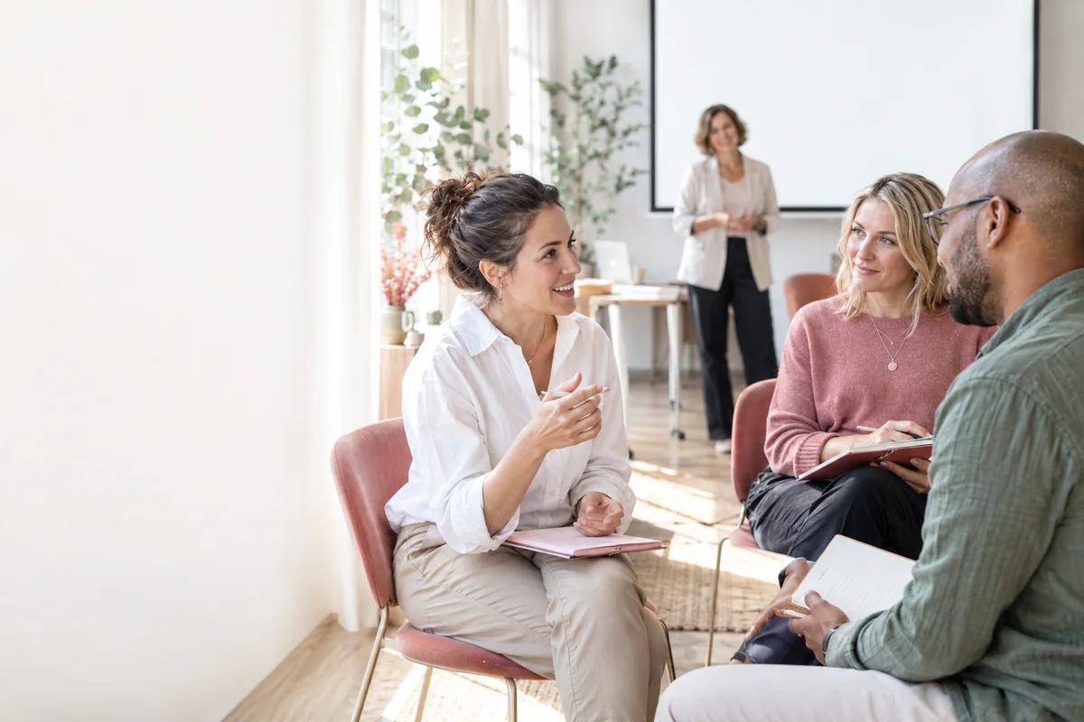 Events & Development | CAQA Updates A team collaborates during a professional learning workshop, showcasing CAQA Updates' commitment to skills development.